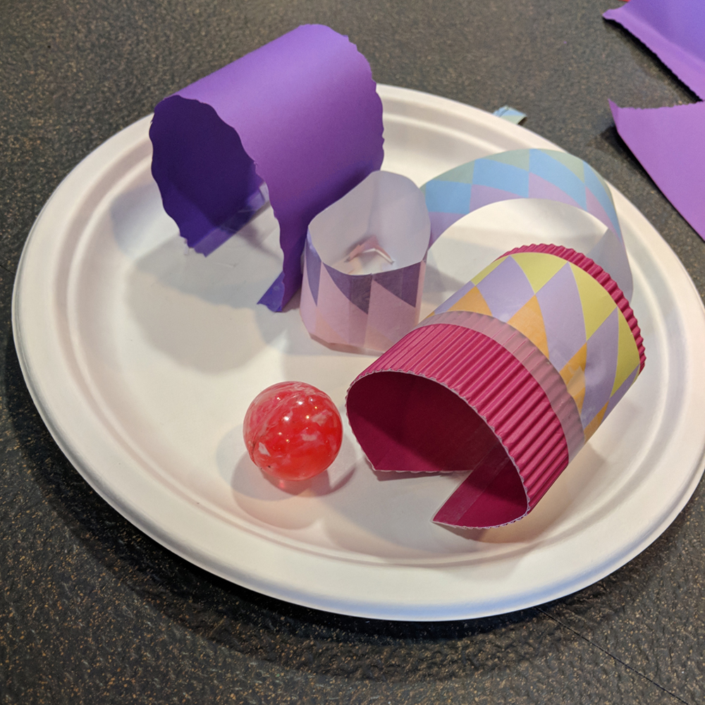 Makerspace marble mazes challenge on plastic plate