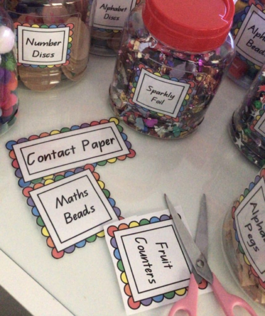 Labelling classroom resources featuring storage jars with descriptive labels