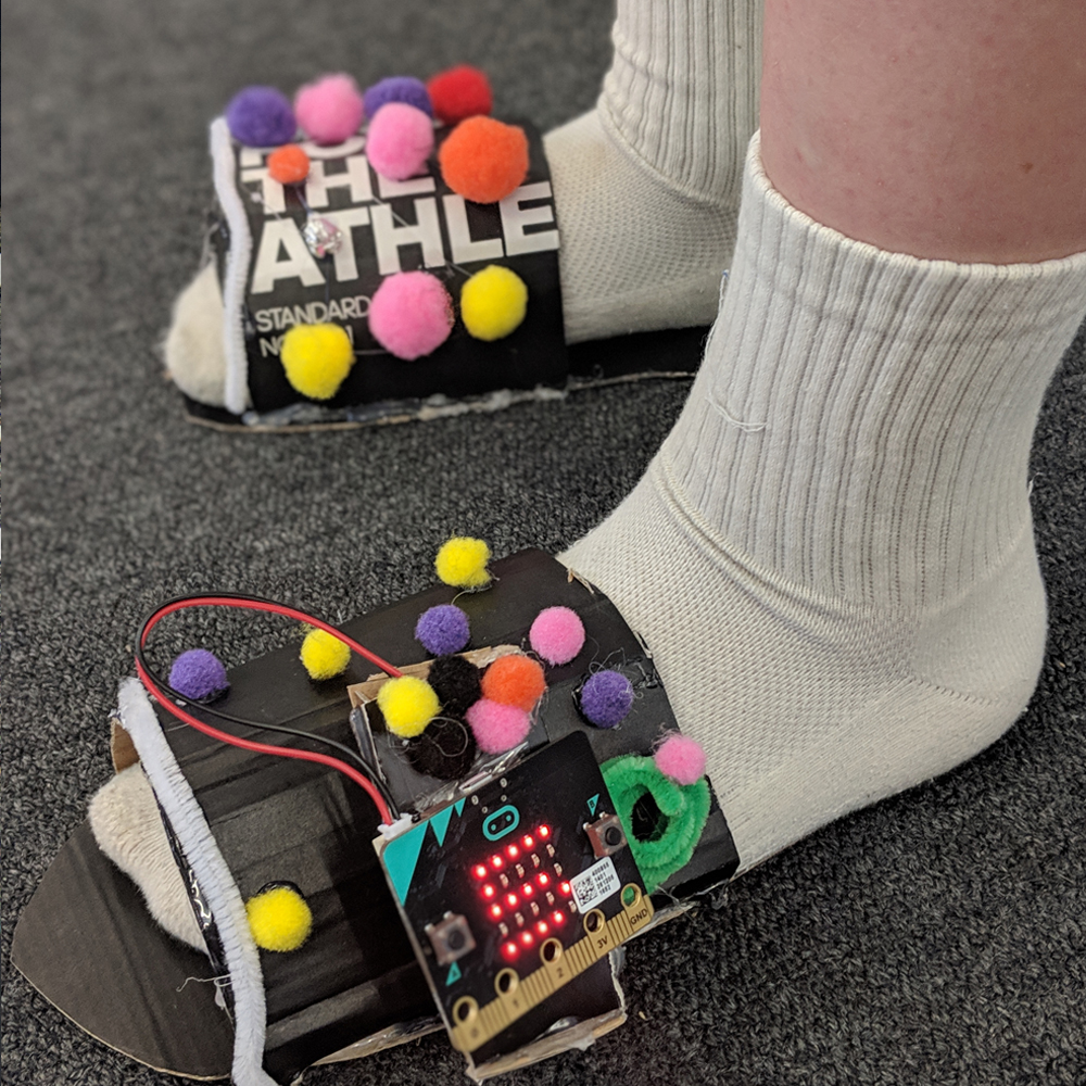 Microbit activity using light sensors and pom poms on shoes