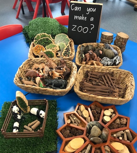 Natural resources and figurines sorted and organised in storage baskets