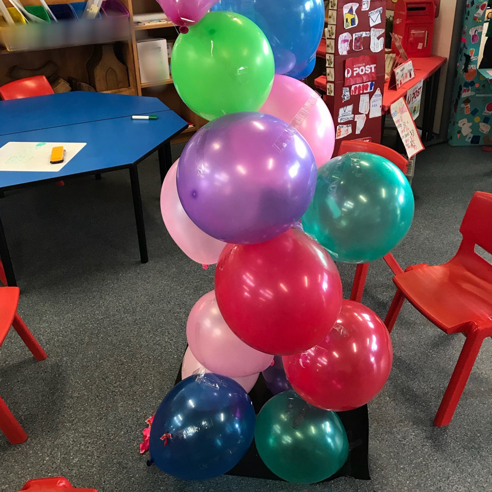 Balloons stacked in a tower