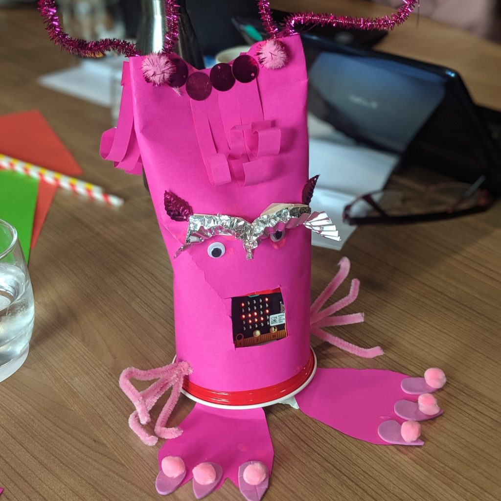 microbit pet pink on classrom desk