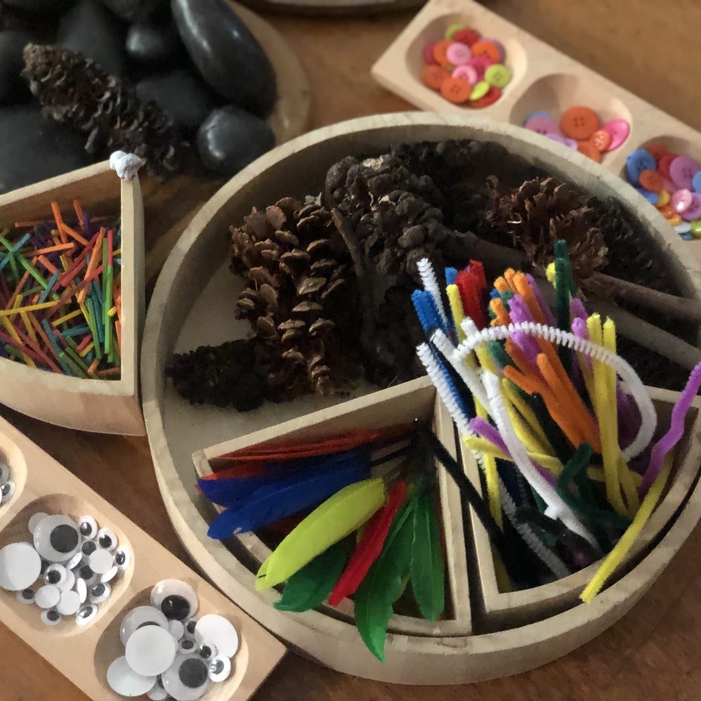 Sorting trays full of various loose parts square