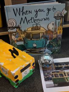 Sphero Integrated learning Activity. When you go to Melbourne book. Paper mache bus & Sphero Robot on table