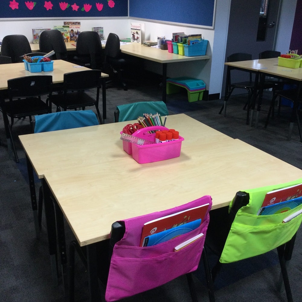Filled Chairbags and Classroom Caddies on Desk in classroom