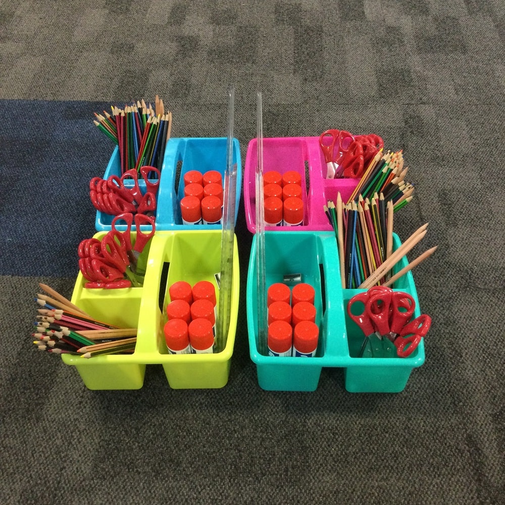 Filled Classroom Caddies on classroom floor