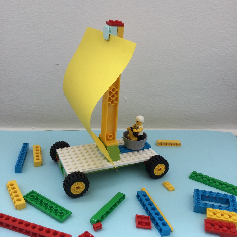 LEGO BricQ Sailing Car Model on table
