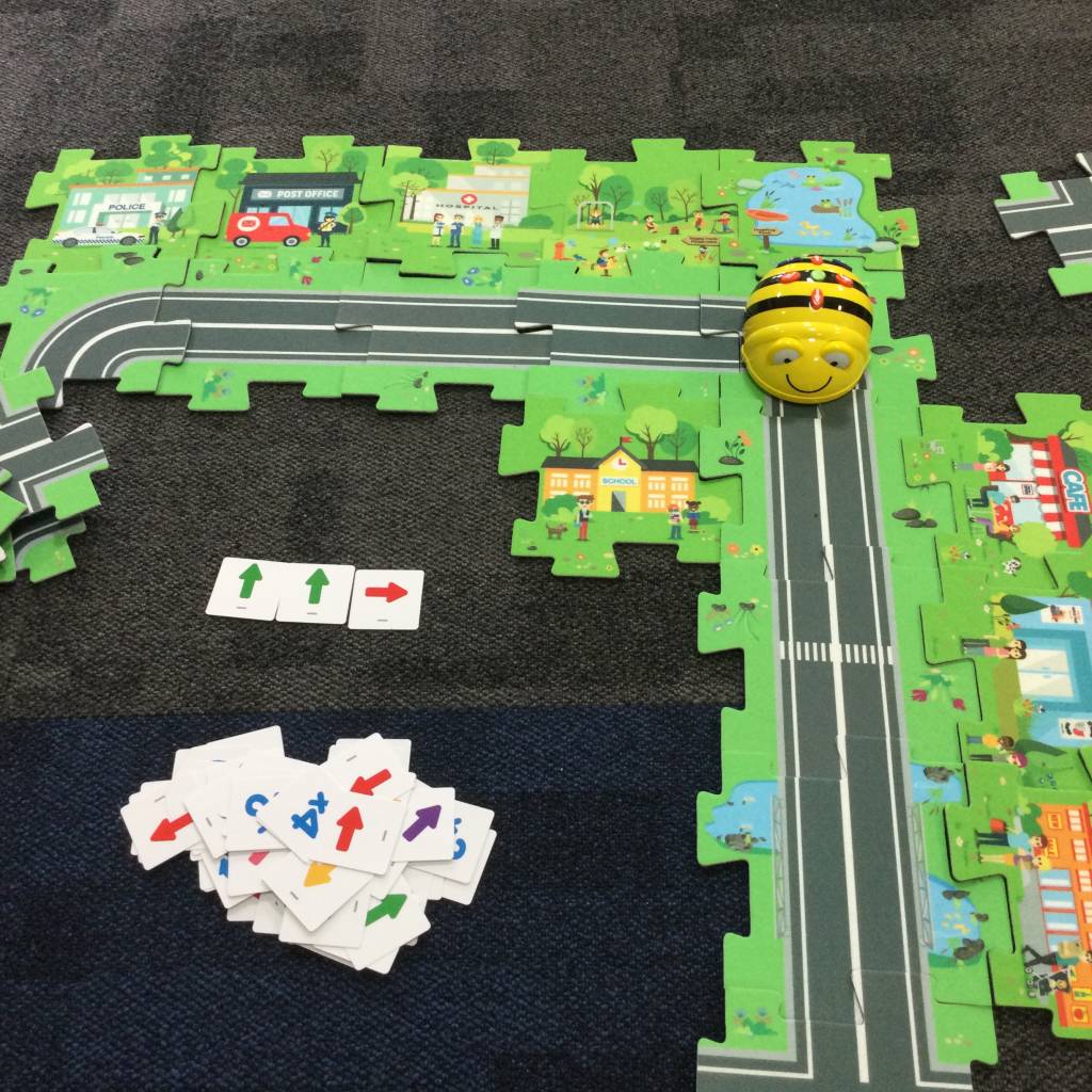 Beebot Road Maze Mat with Bee-bot on classroom floor