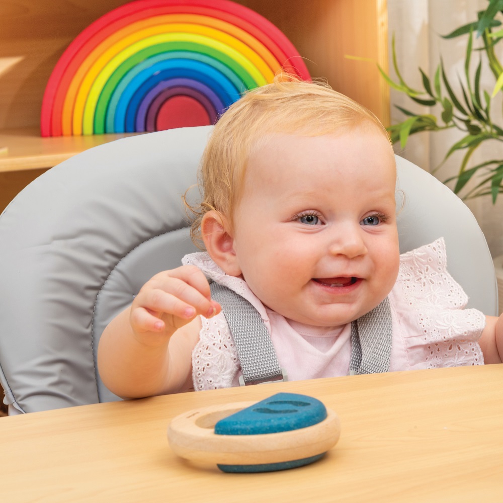 baby sat in Max & Rosie Feeding Chair