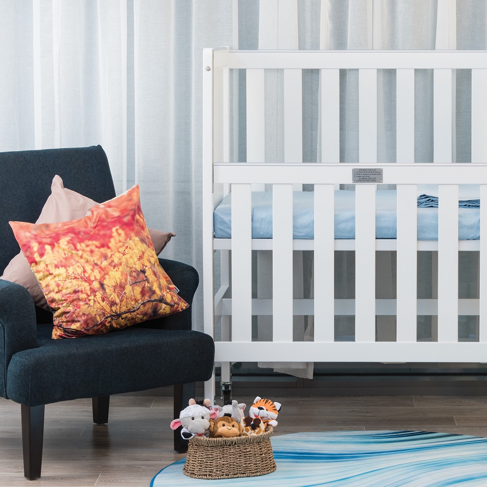 White cots and blue armchair & cushions