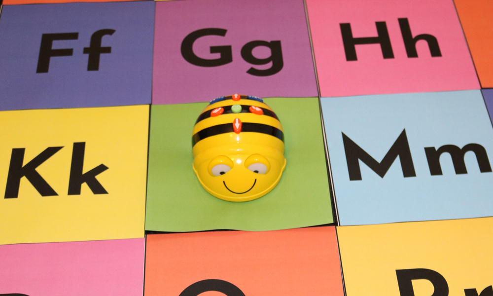 Literacy Bee-Bots Activity Bot On Multi-coloured Upper & Lower Case Letter Grid